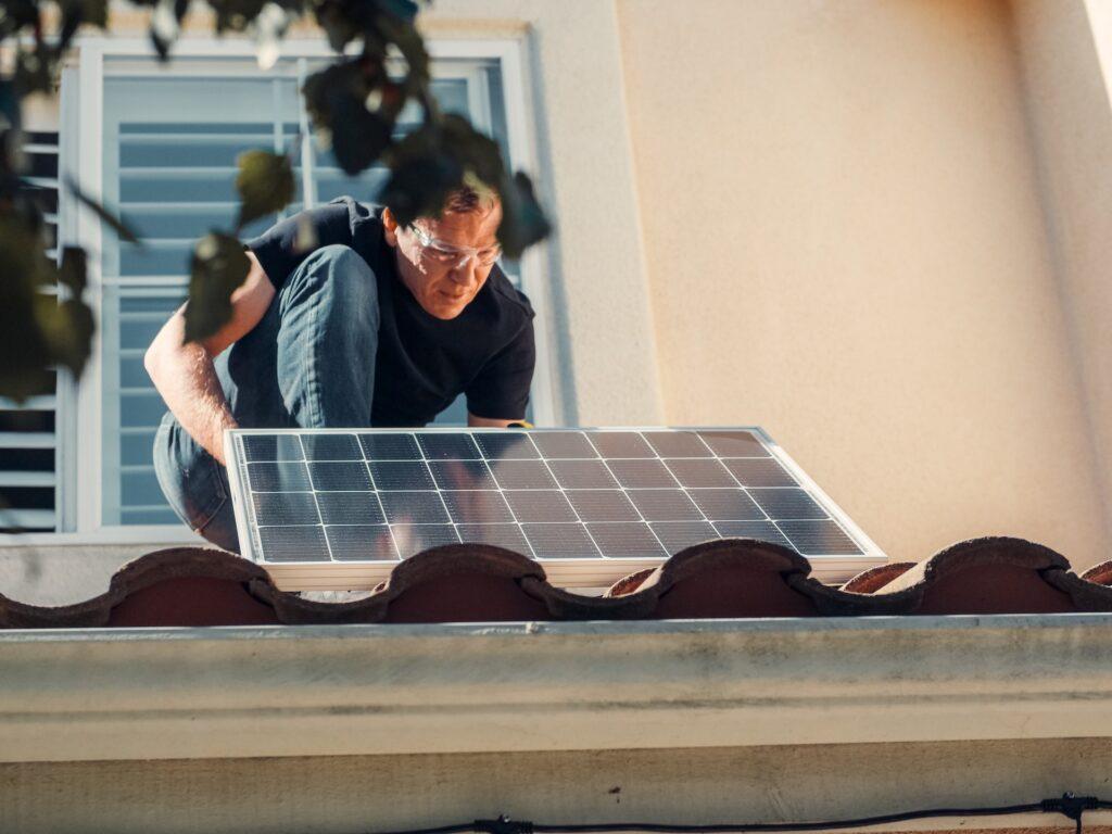 Solar Panels held by a man